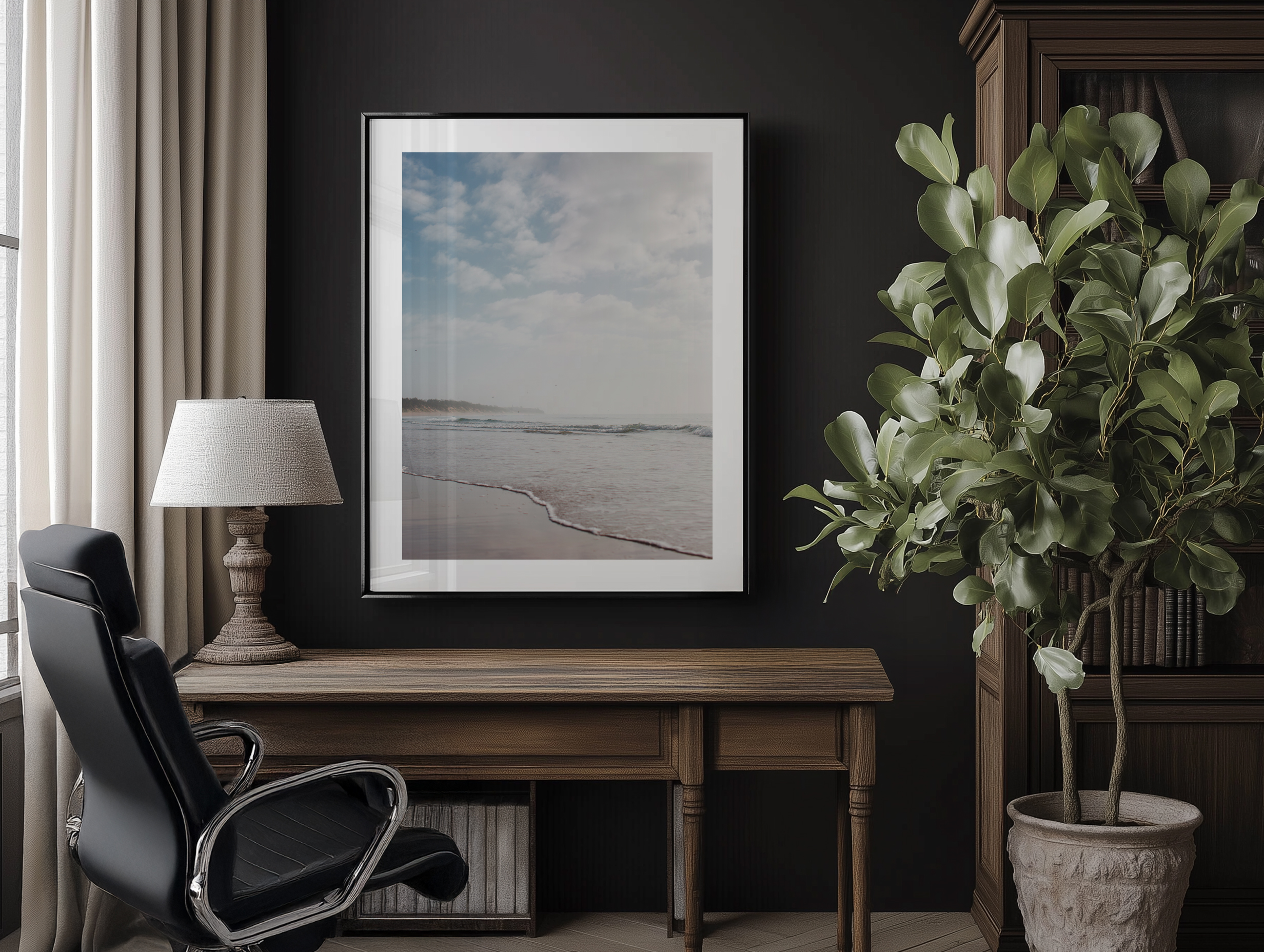 Black framed art mock up styled on a hotel desk space with clean lines and neutral tones.